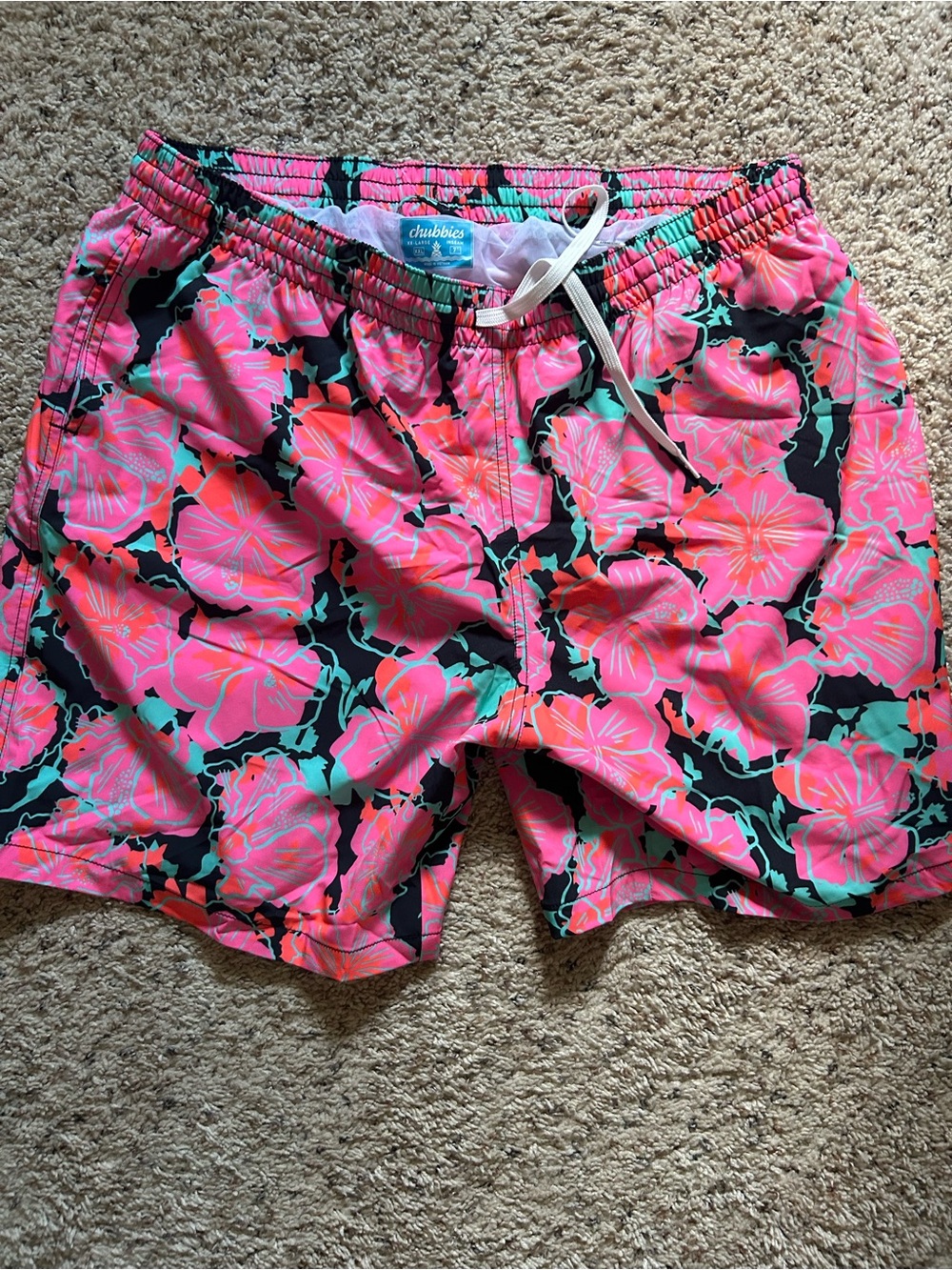 chubbies Neon Pink Floral Swim Shorts with Mint Accents